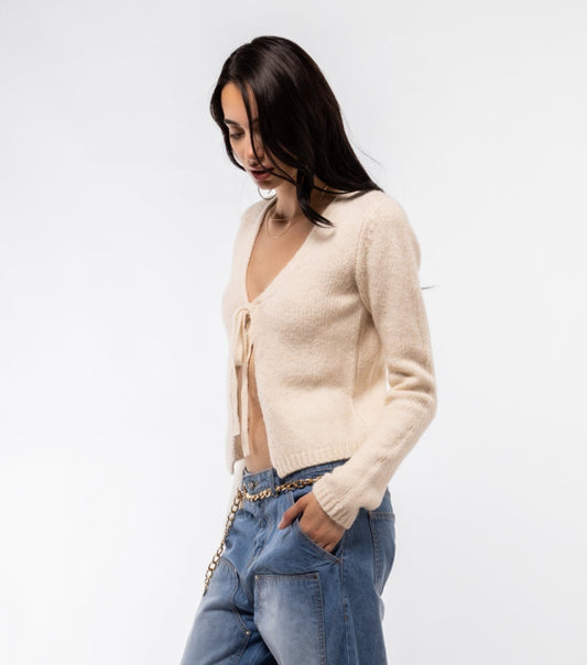 Profile of ecru knit sweater – casual side look

