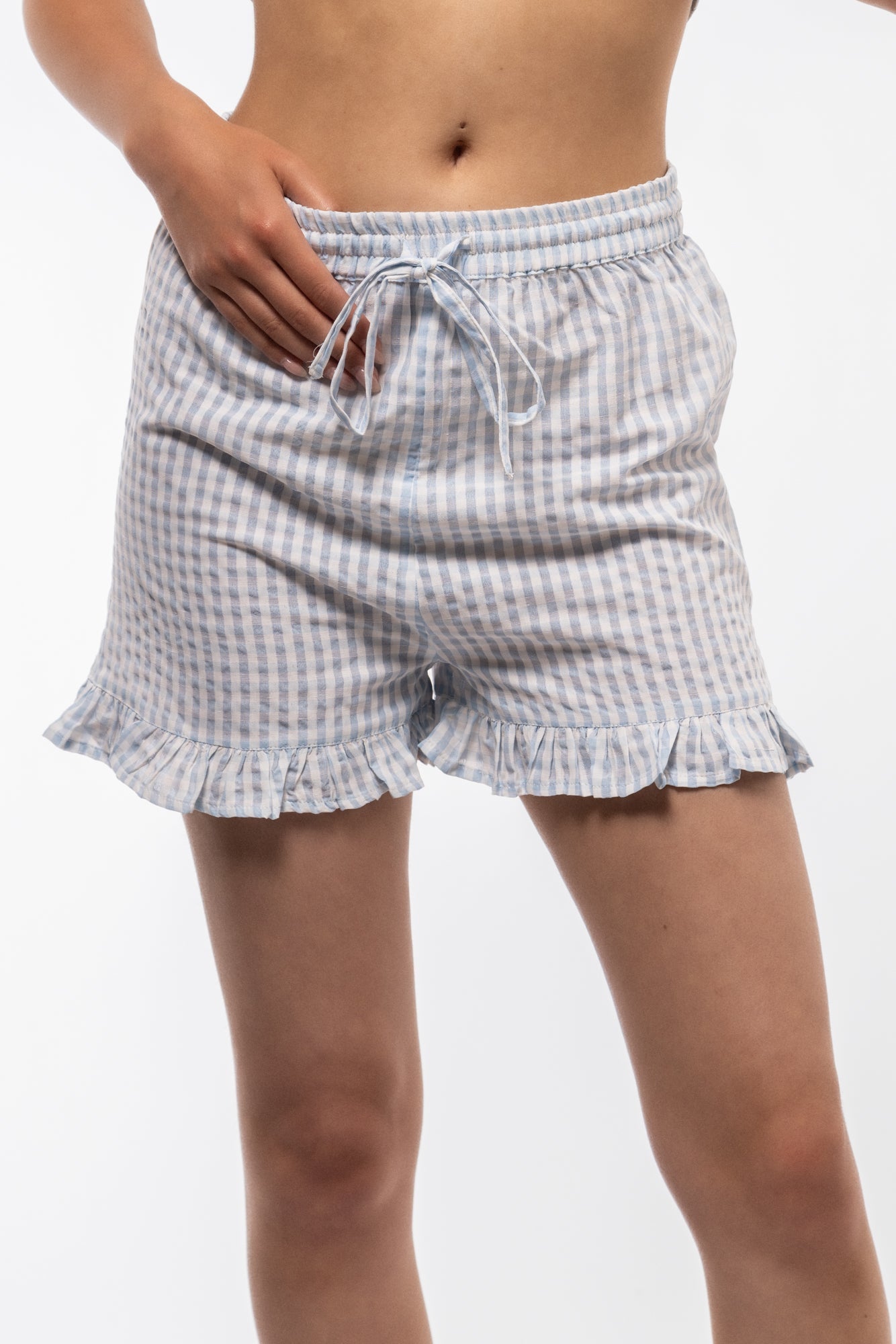 GINGHAM RUFFLE HEM SHORTS SILKROAD DAUGHTERS