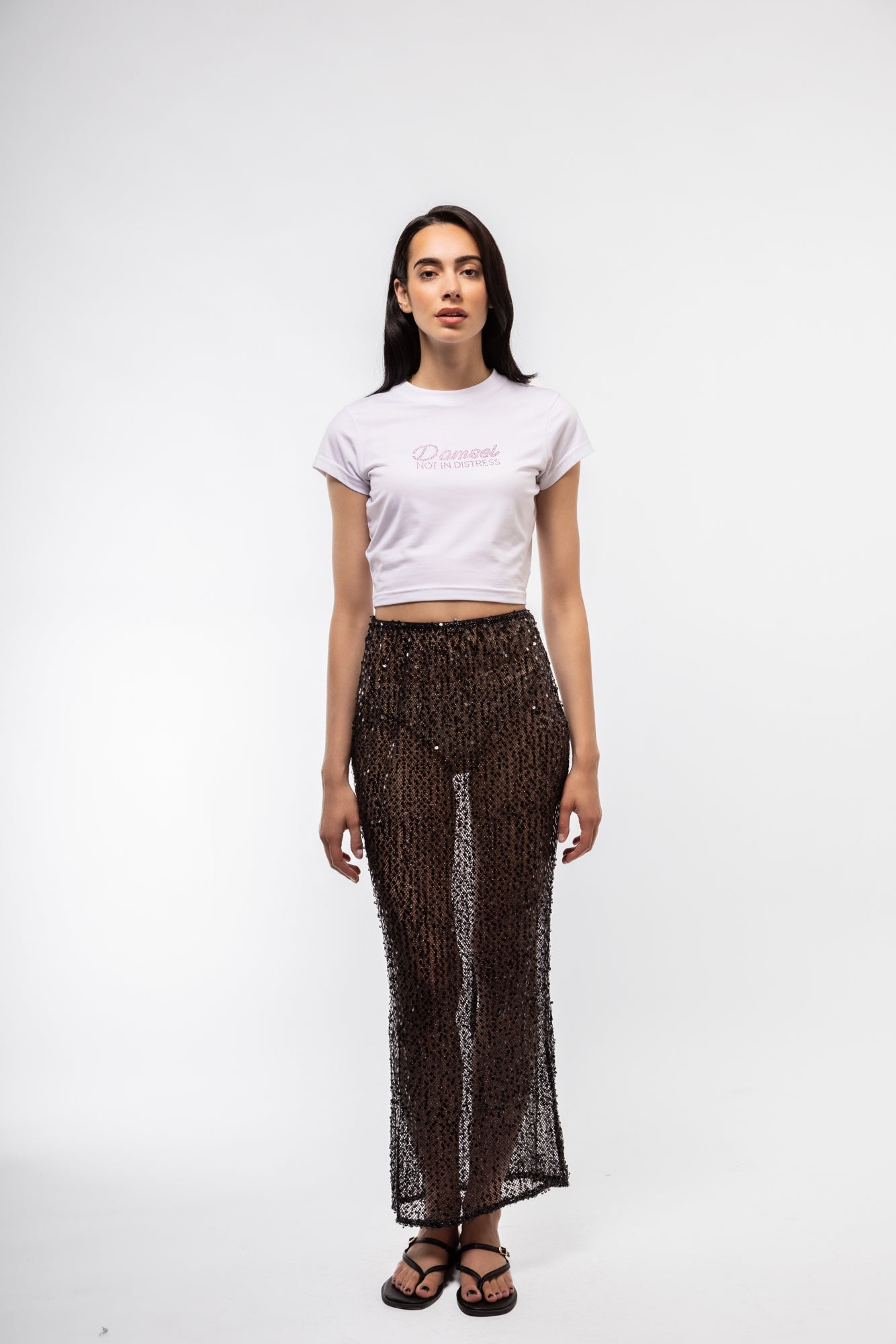 Sequin embellished knit skirt – front profile, mid-length design

