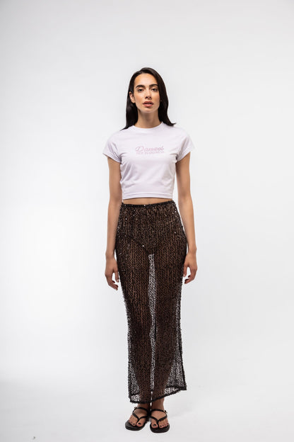 Sequin embellished knit skirt – front profile, mid-length design

