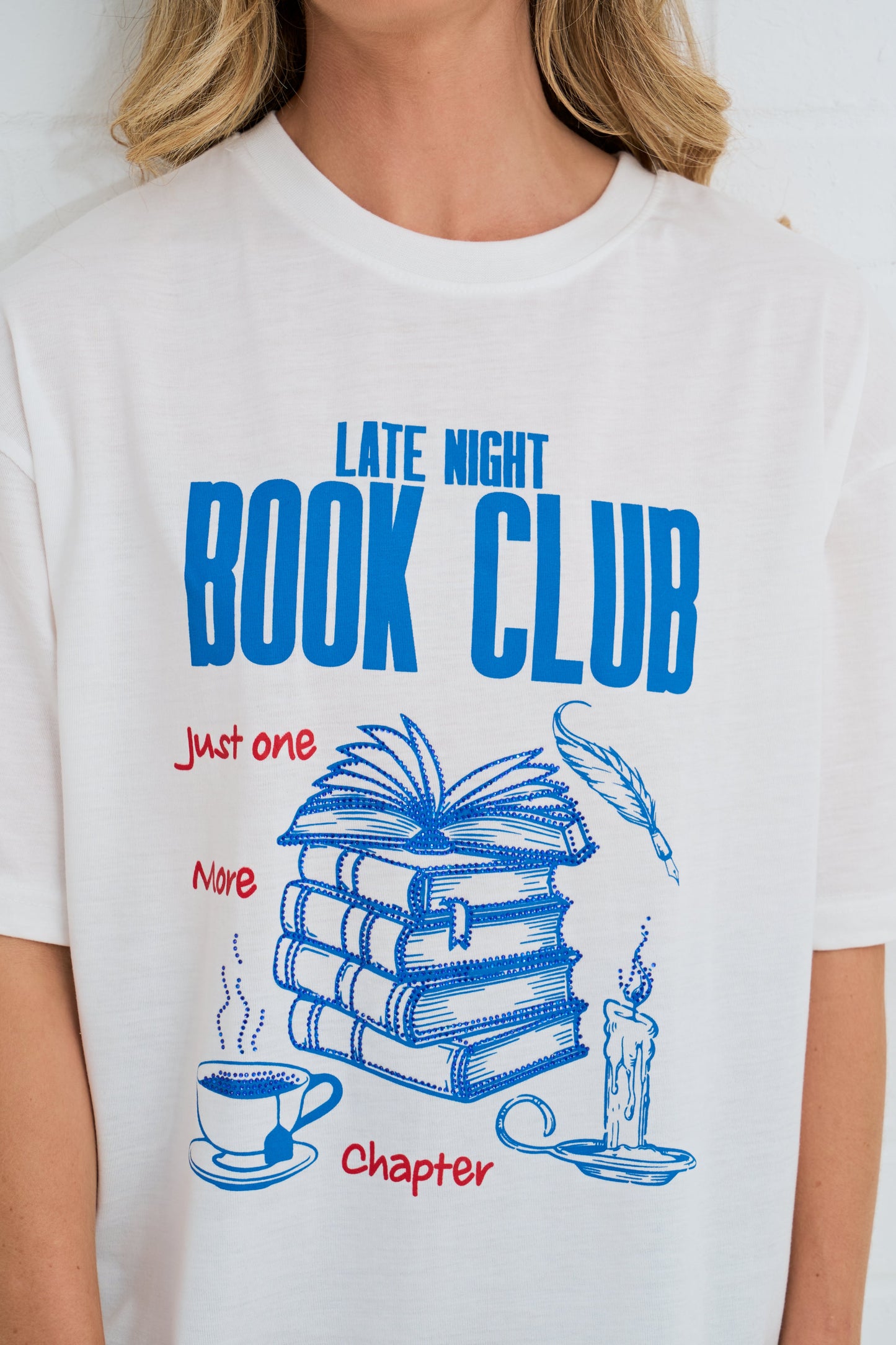 White t-shirt with 'Late Night Book Club' design featuring books, a candle, and a cup.