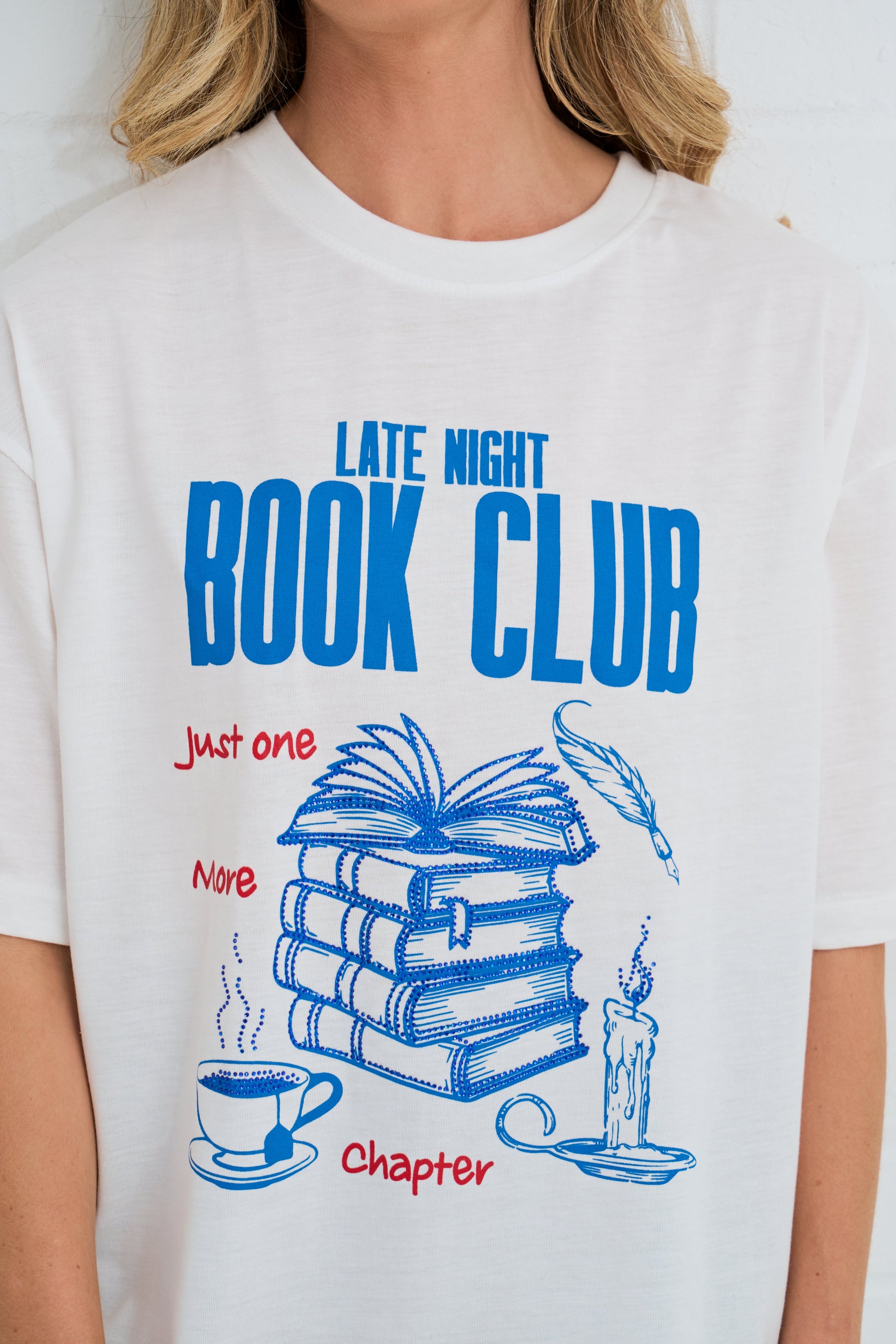White t-shirt with 'Late Night Book Club' design featuring books, a candle, and a cup.