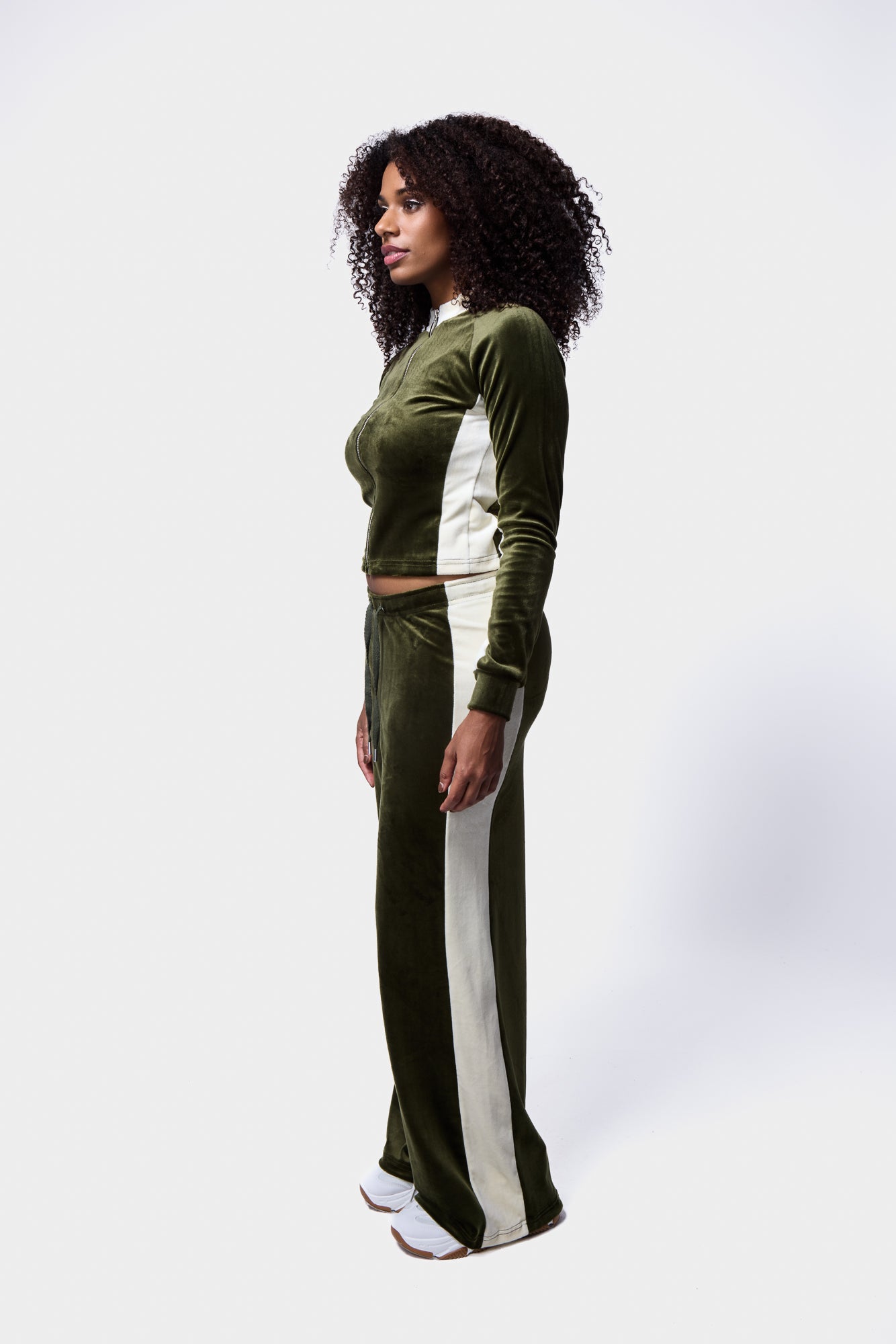 khaki velour top with white trim and panelling