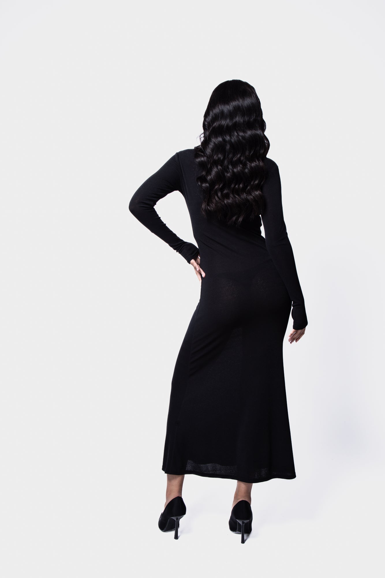 Versatile sheer knit maxi dress with long sleeves and elegant detailing