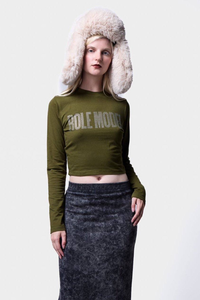 Acid wash tube skirt sweatshirt displayed in a studio setting with studio lighting.