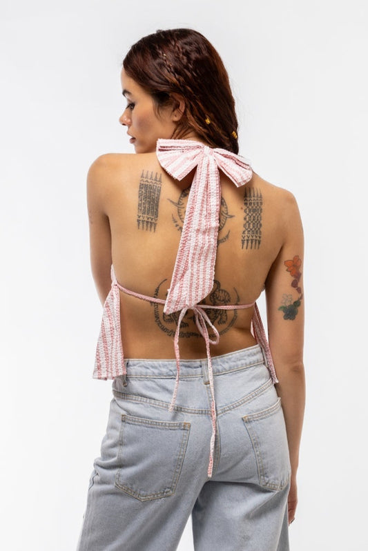 Women’s striped halter peplum crop top with open back and light wash denim Bermuda shorts – trendy summer outfit