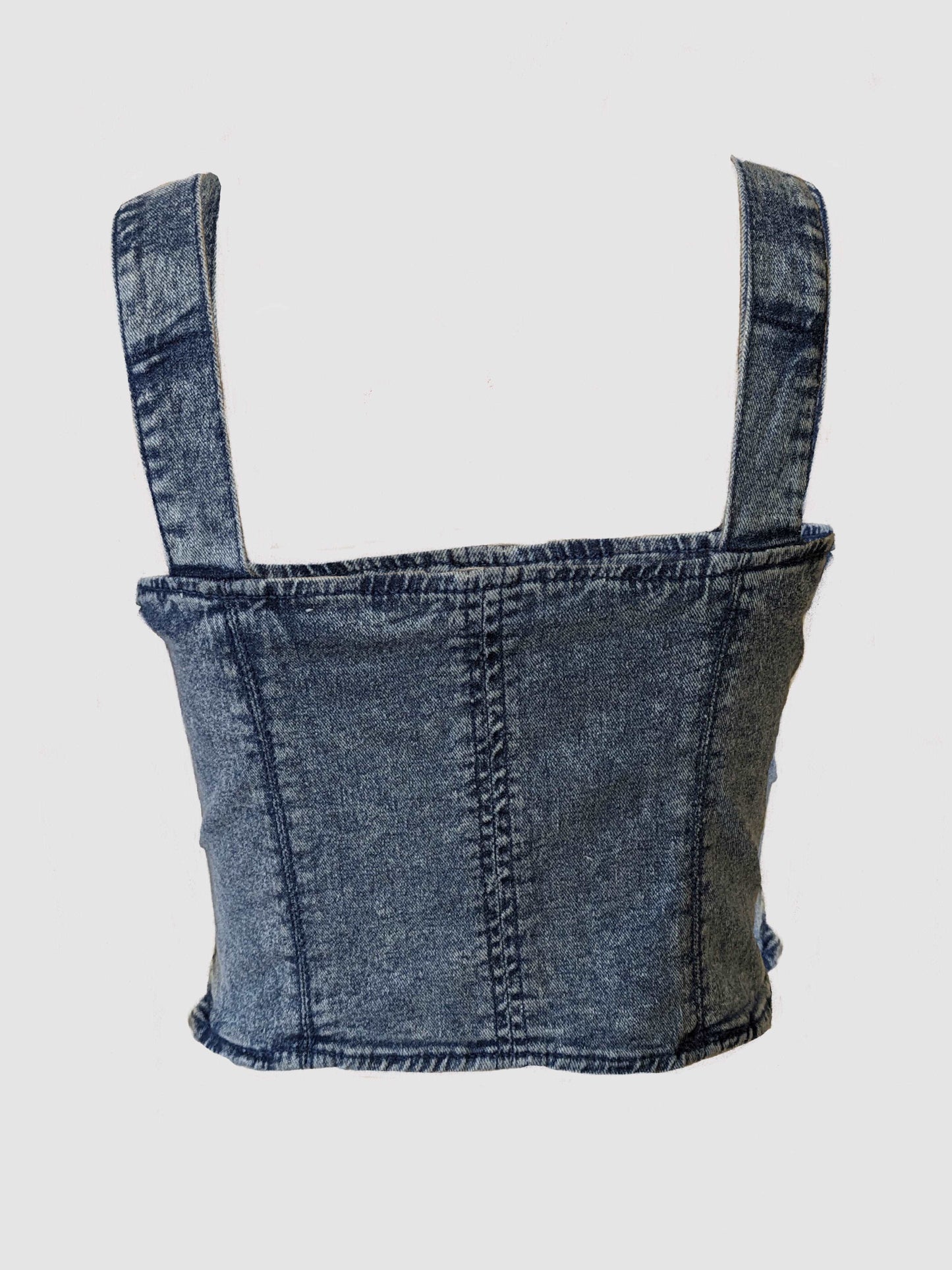 a denim top with a hole in the back