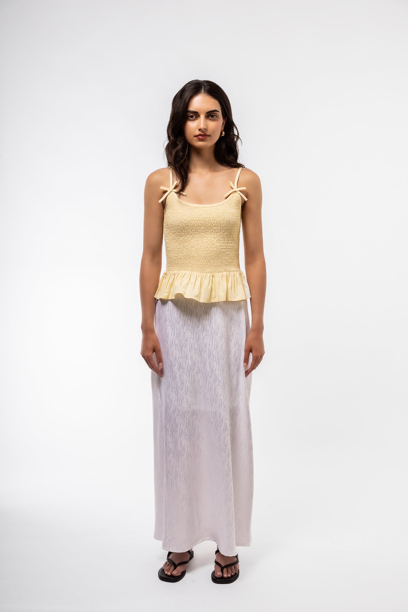 front profile image of the shirring lemon yellow bow top 