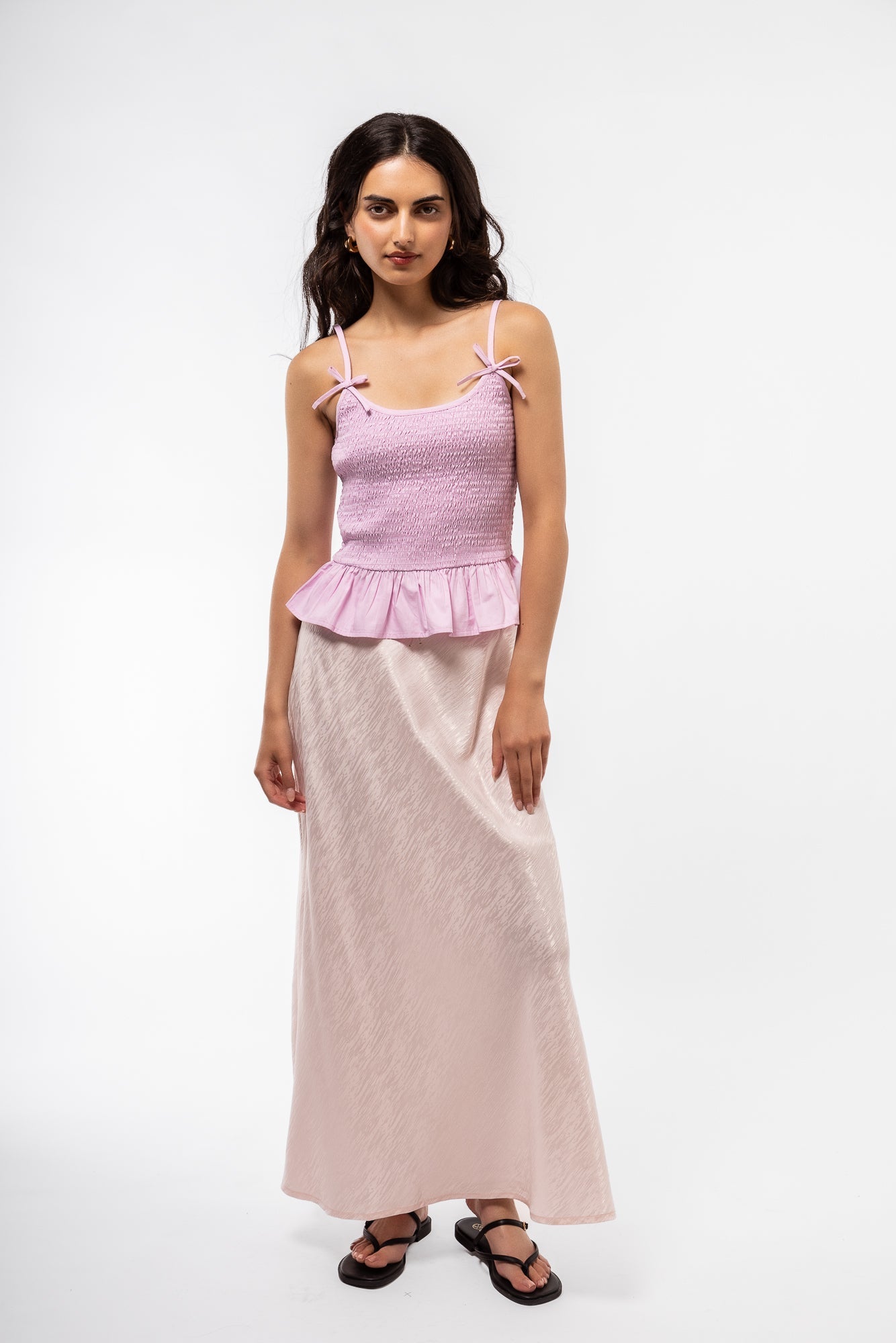 front profile of model wearing the shirring bow tank top 