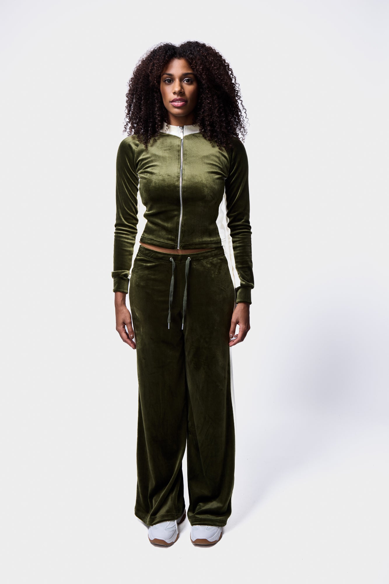 Khaki velour top with white trim and paneling