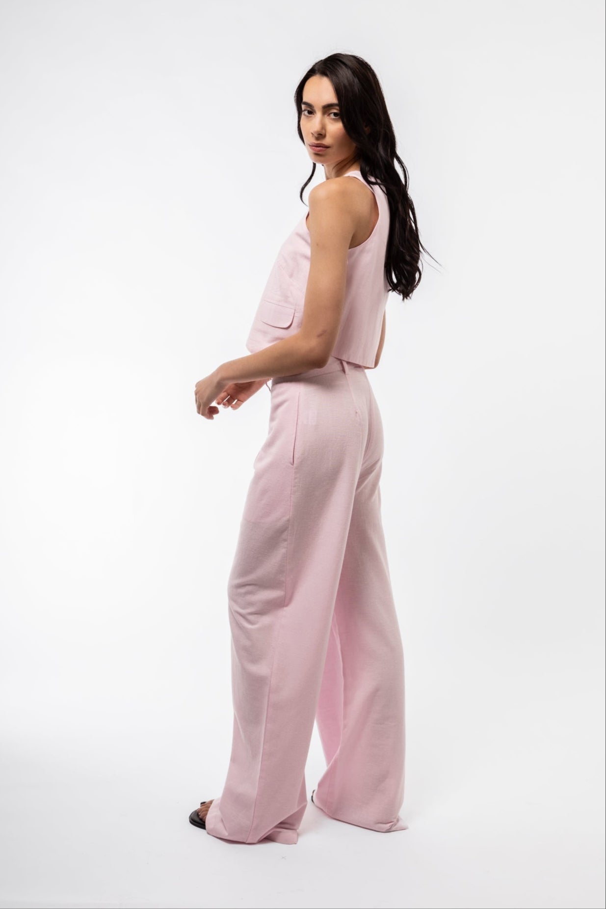 side profile view of the pink woven waistcoat cotton blend line vest 